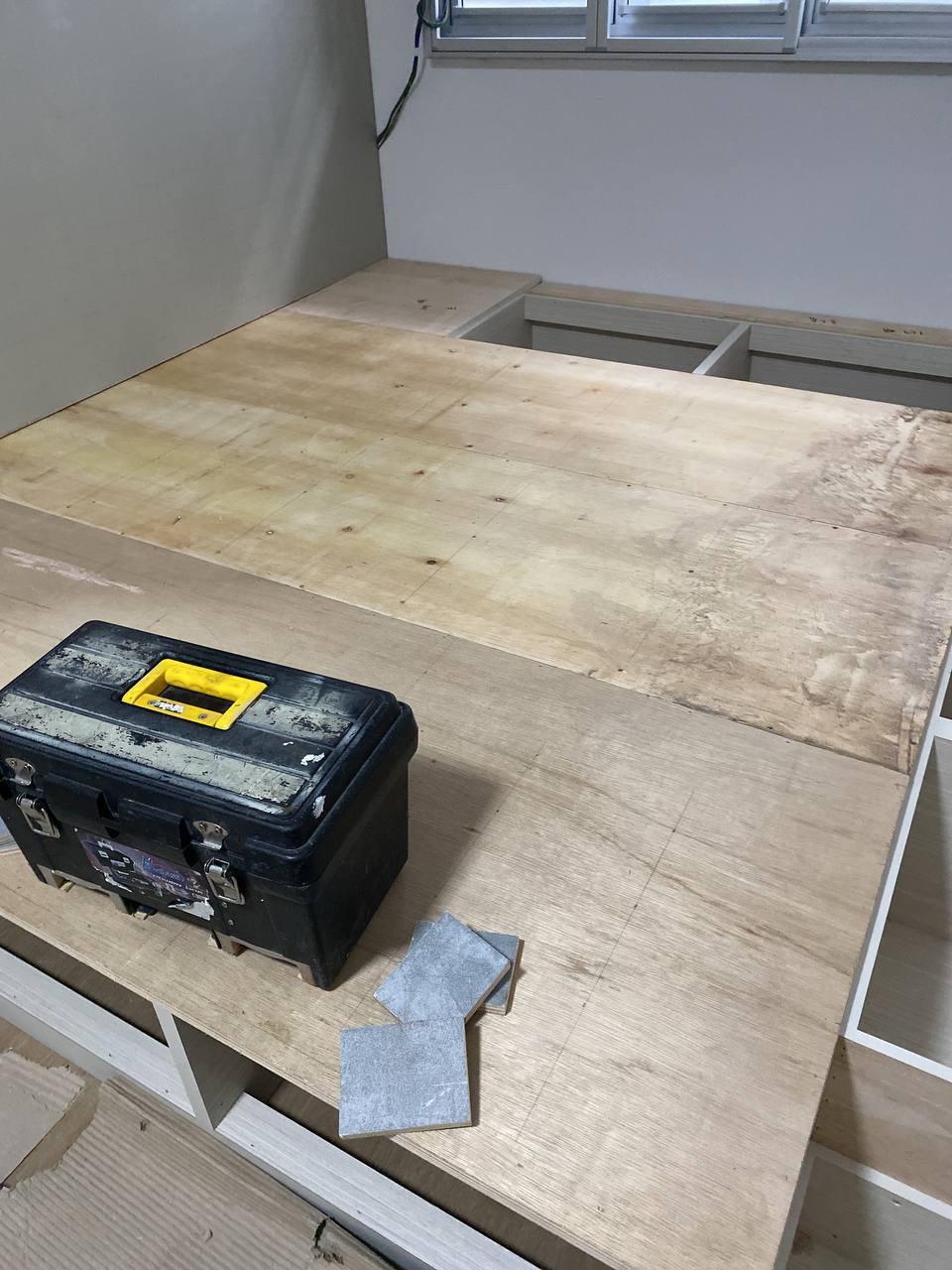 Carpentry base platform being prepared during a RenoMate renovation site review